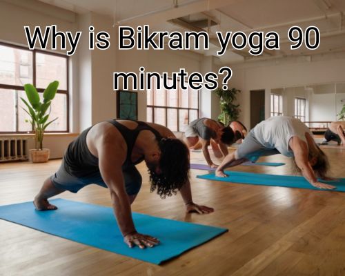 Practitioners stretches deeply during Bikram yoga session.